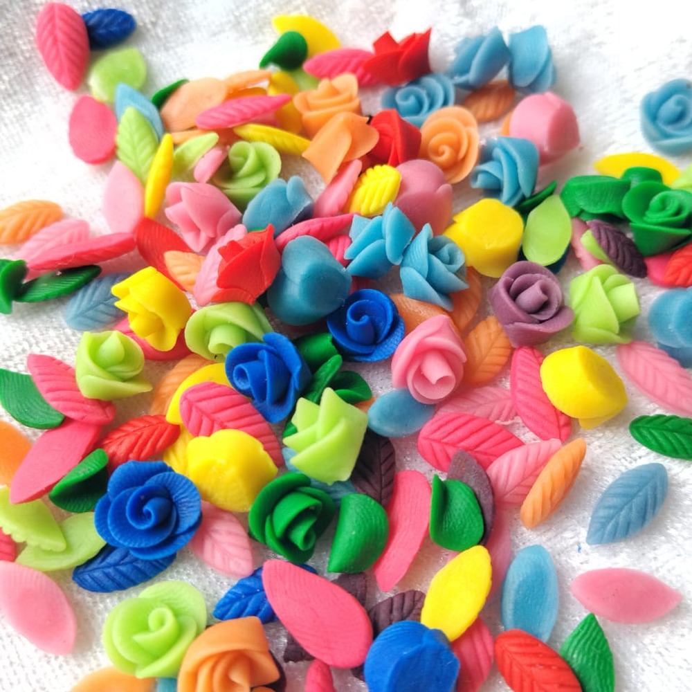 Hand-painted clay flowers and finishing details