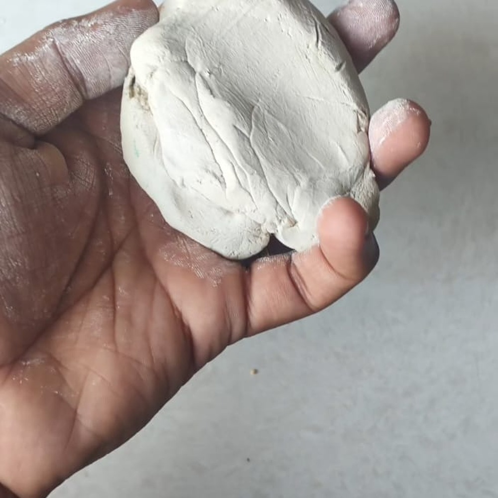 Shaping clay by hand