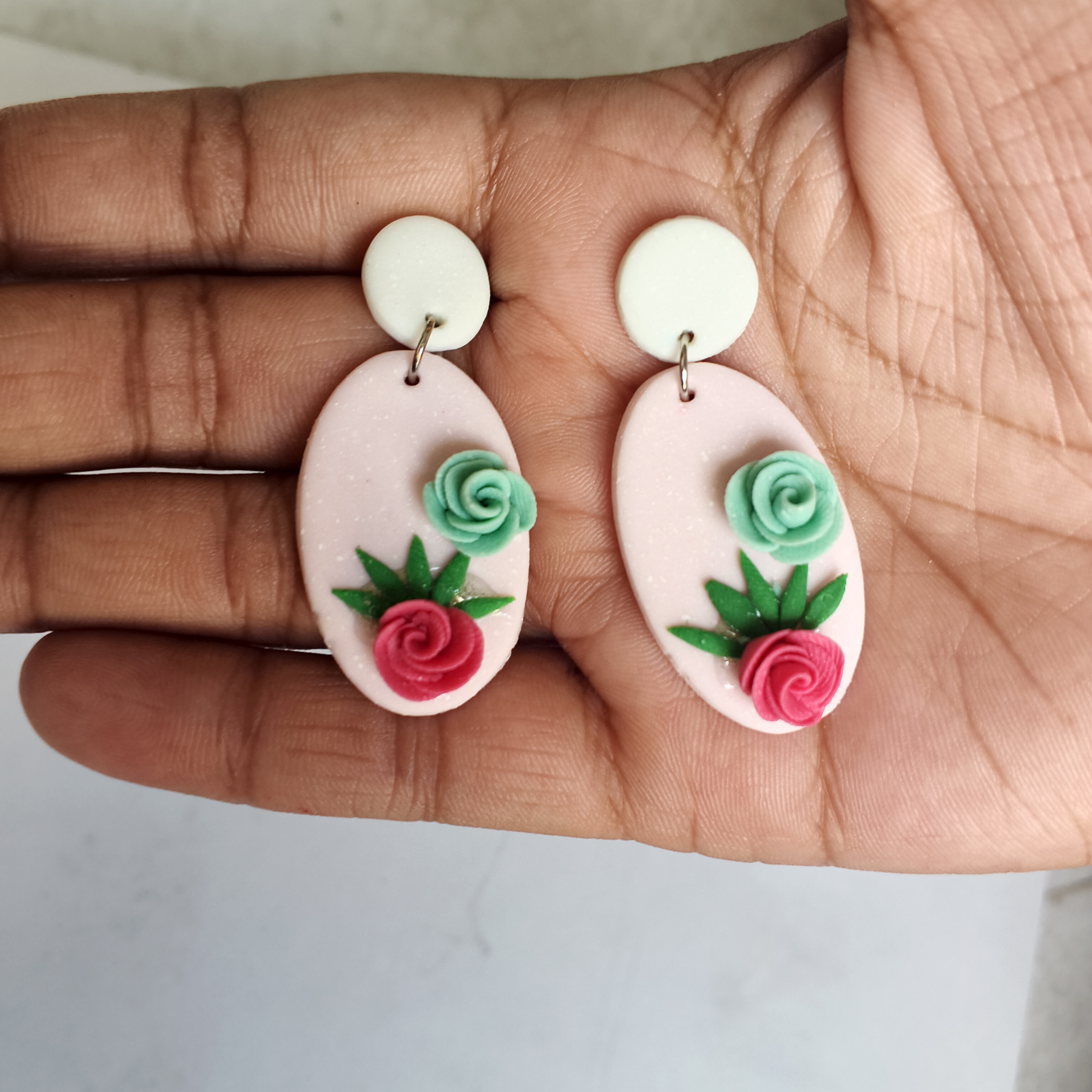 A finished, checked KalaaSiddhi earring ready to wear